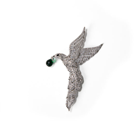 Bird with green stone brooch